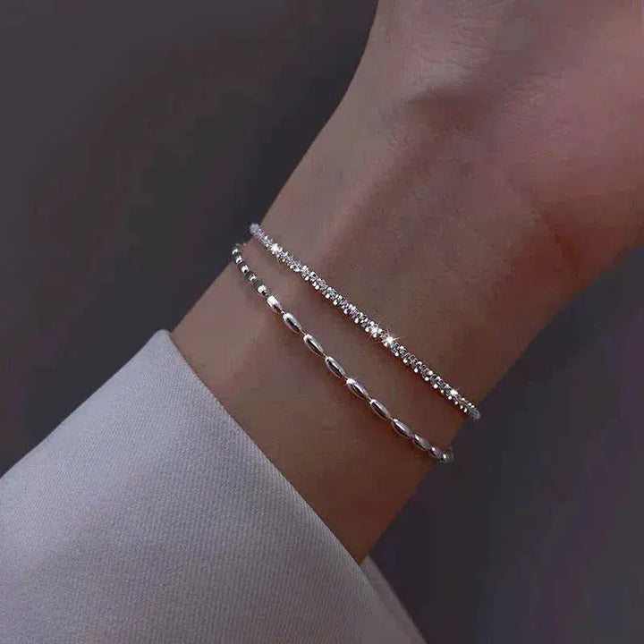 Elegancki zestaw w kolorze srebra bransoletki z kamieniami cyrkoniowymi