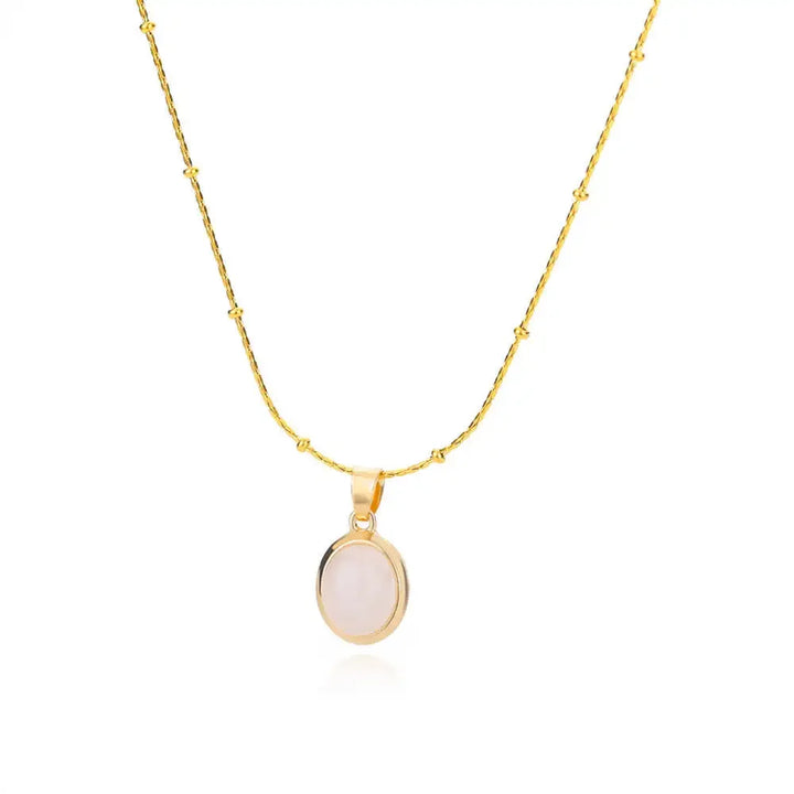 Elegante collar de acero inoxidable w kolorze złota con colgante de ópalo en forma de gota de agua