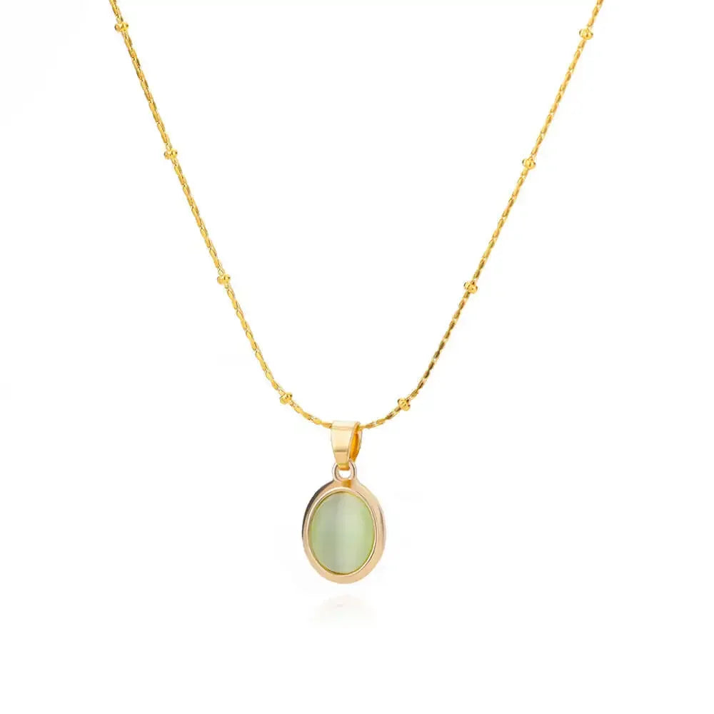 Elegante collar de acero inoxidable w kolorze złota con colgante de ópalo en forma de gota de agua