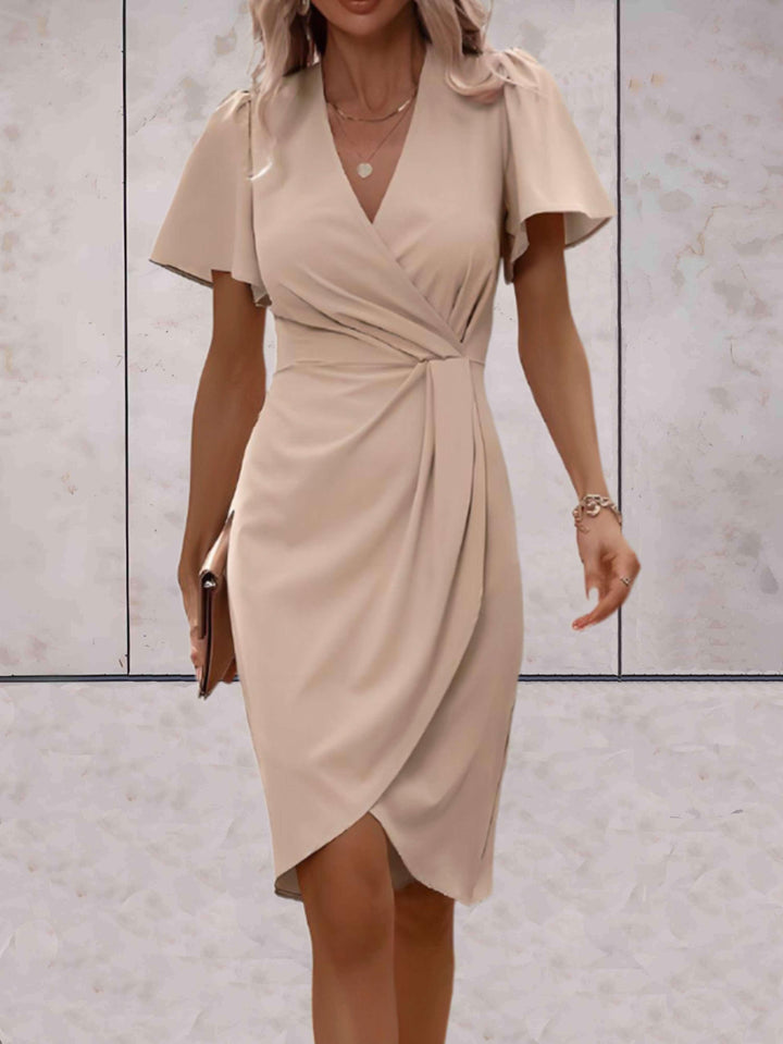 Wickelkleid mit V-Ausschnitt Wedding guest dress w kolorze Beżowy